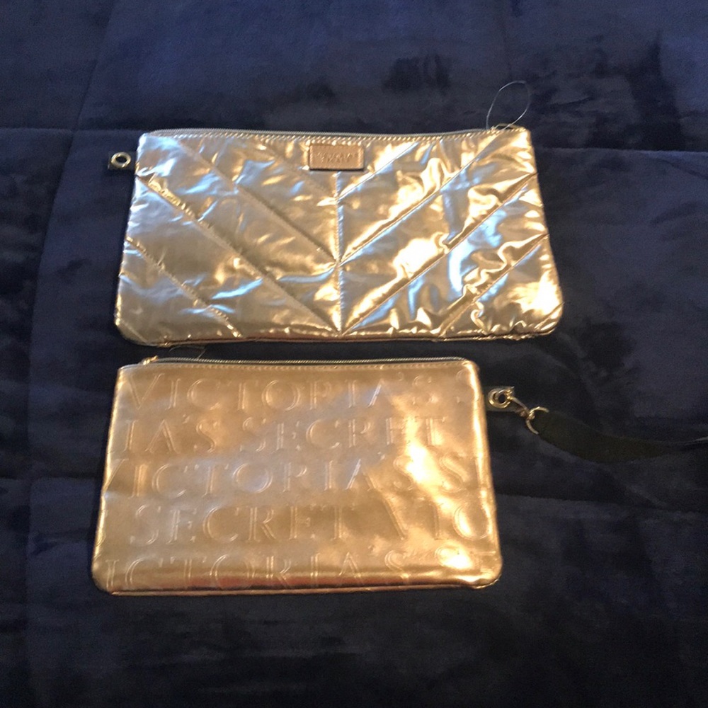 Two Victoria’s Secret make up bags